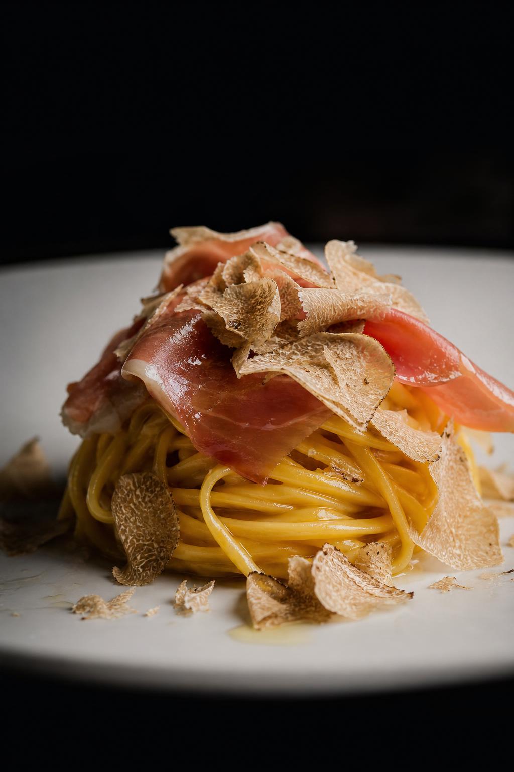 Tagliolini al tartufo e prosciutto crudo